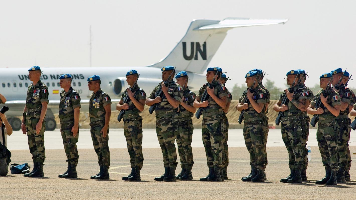 Officers of the United Nations Mission in the Central African Republic and Chad (MINURCAT) take over military operations of the mission from the European Forces (EUFOR) during a transfer of authority ceremony.