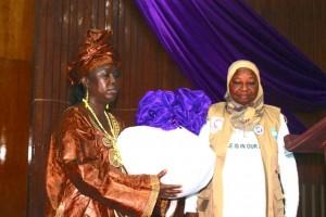 Hon. Dr. Lahai receiving the peace cloth at the closing ceremony of the WSR in Sierra Leone.